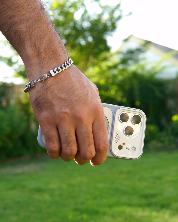 ArcStand Magnetic iPhone Case, polished portrait shot of the built-in kickstand