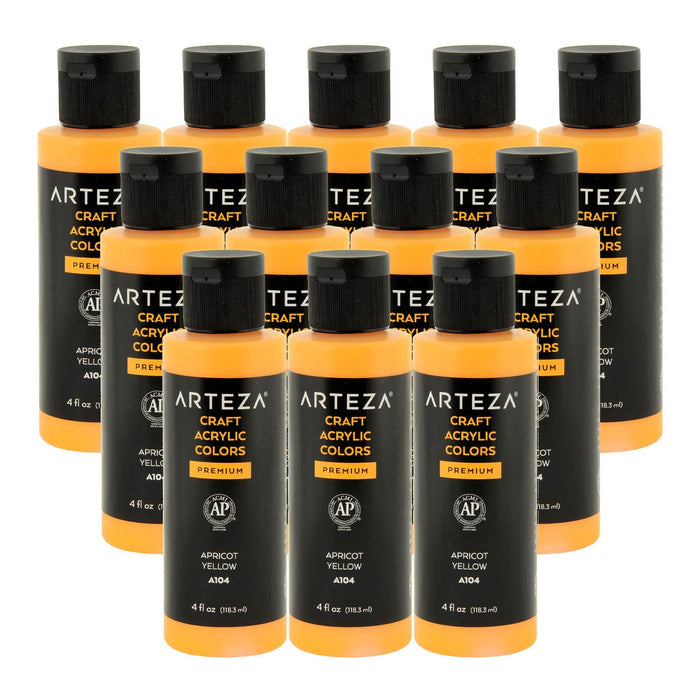 12 bottles of aricot yellow colour acrylic paint on a white background