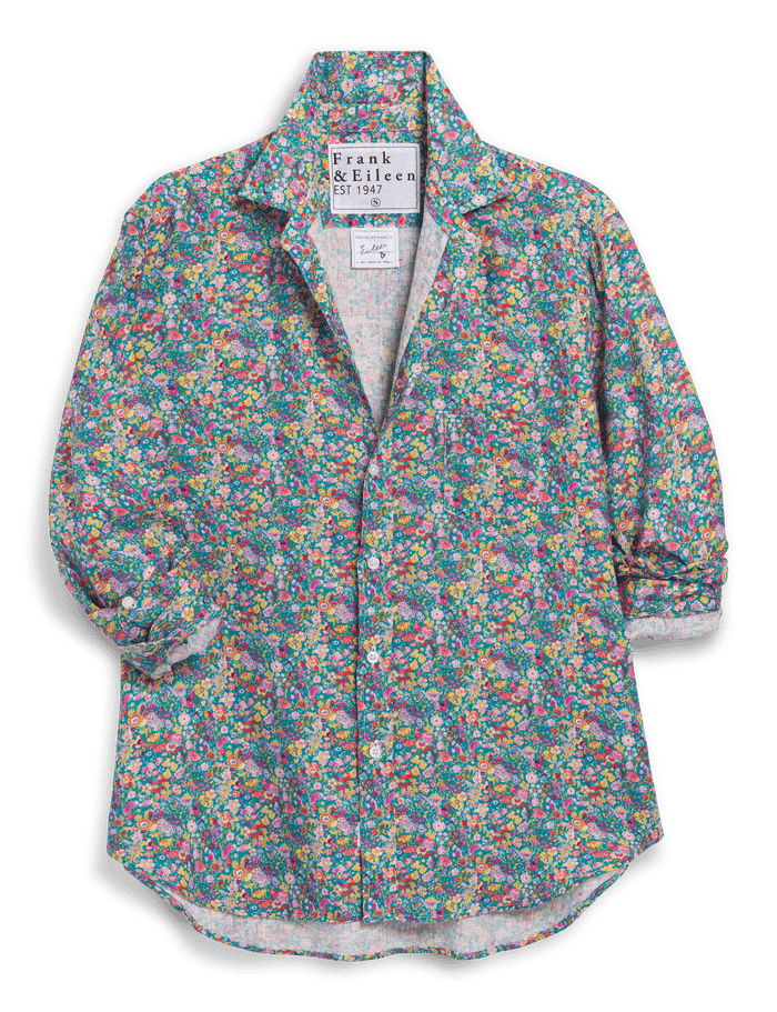 Floral patterned shirt with brand label on a transparent background