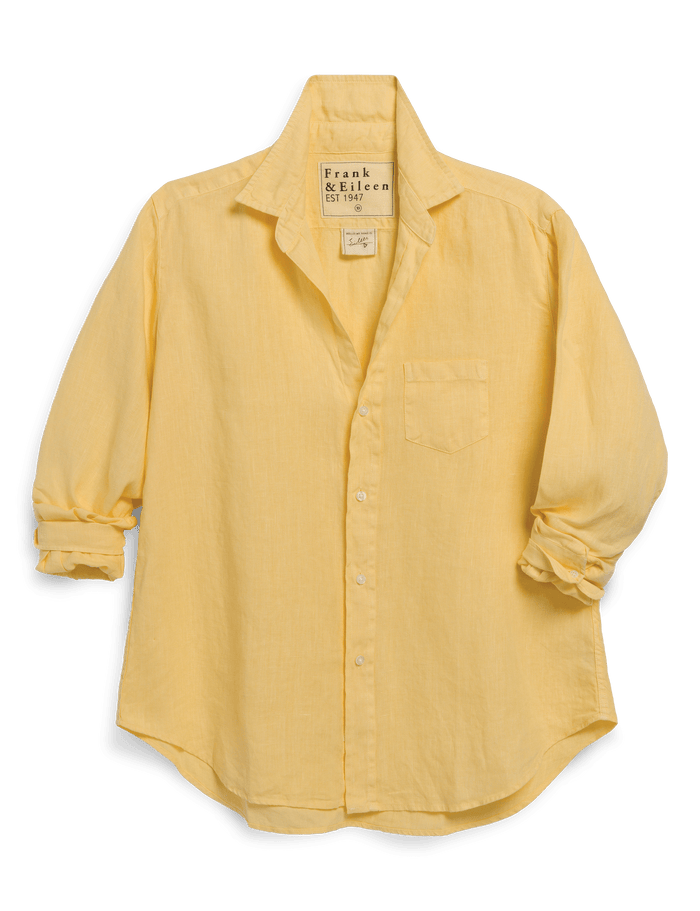 Yellow shirt with a brand label on a transparent background