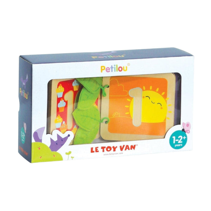 Le Toy Van Petilou puzzle packaging with colorful illustrations on a white background