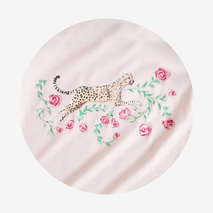 Pink beret with embroidered leopard and flowers on a white background