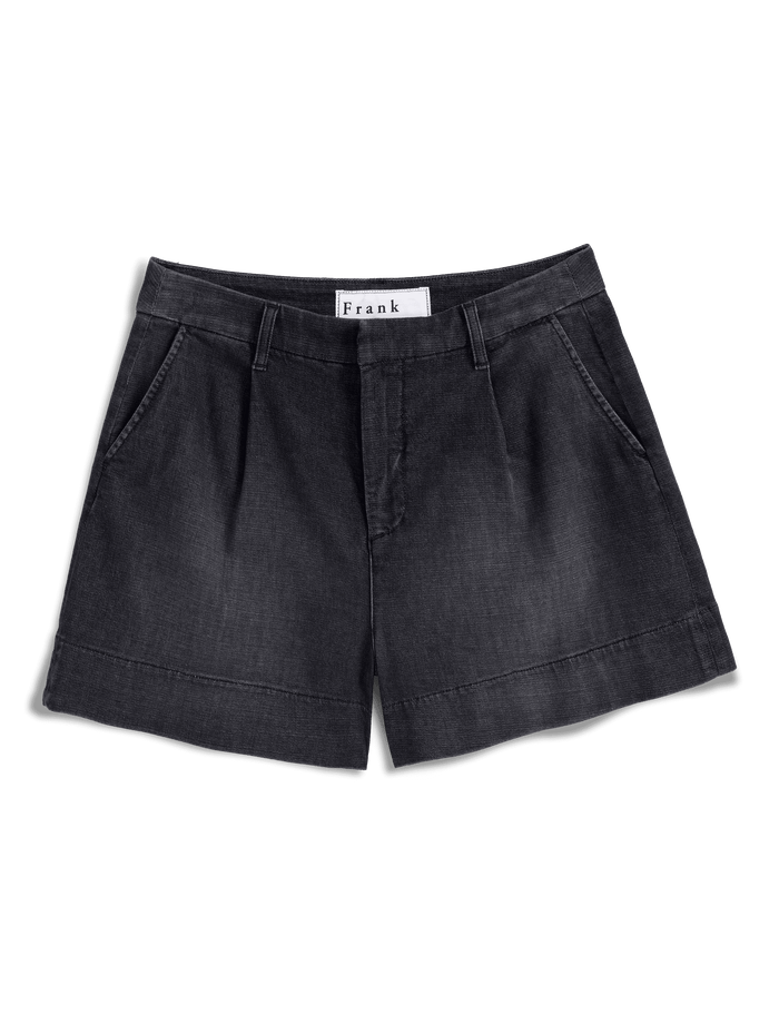 Black shorts with a brand label on a transparent background