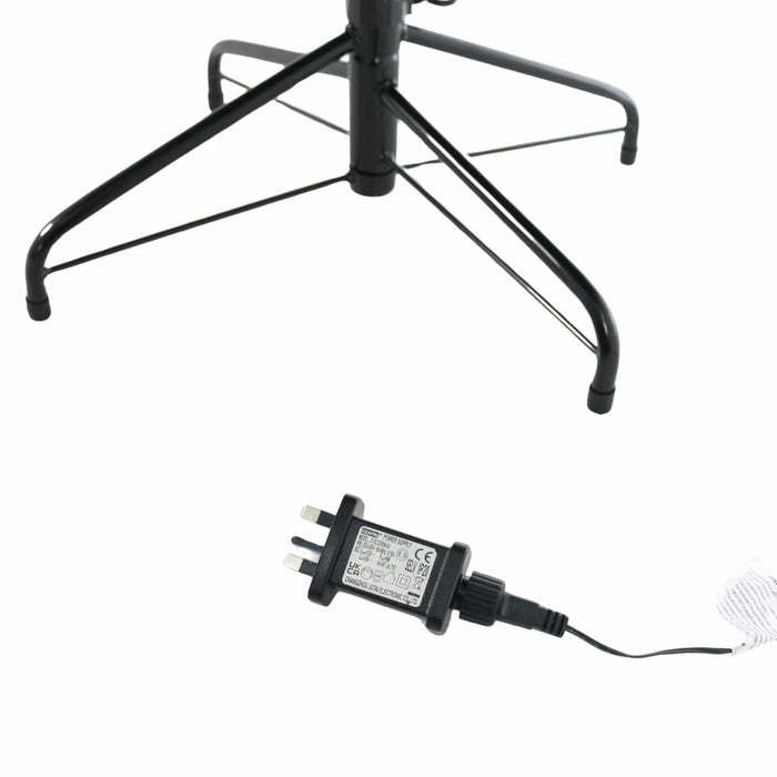 Black electrical adapter with plug on a white background