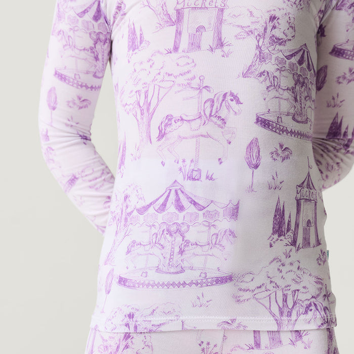 Long-sleeve shirt with purple vintage-style pattern on a light background