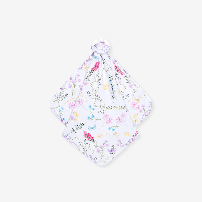 reversible Floral patterned baby lovey on a white background