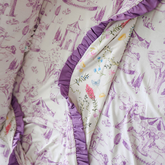 Floral and castle-patterned fabric with purple trim