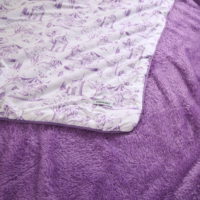 Purple plush blanket with white patterned corner