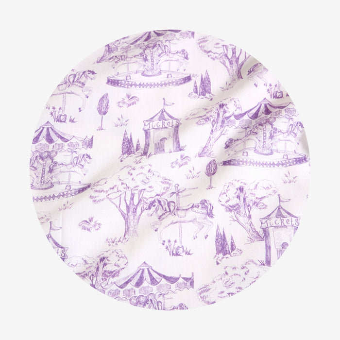 Round purple and white patterned lid on a white background