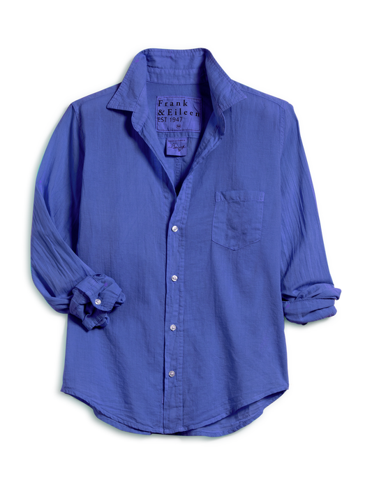 A blue long-sleeve button-down shirt by Frank & Eileen, featuring a chest pocket and rolled-up sleeves, displayed on a clean white background.