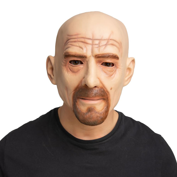 Person wearing a detailed mask with a bald head and beard on a white background