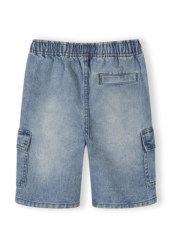 Back view of light blue denim combat shorts with cargo pockets.