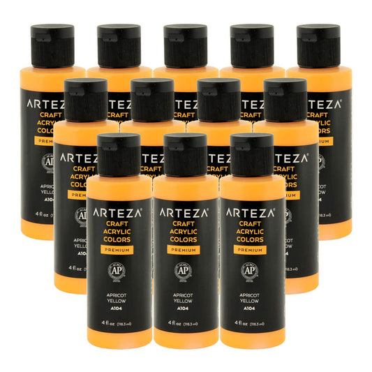12 bottles of aricot yellow colour acrylic paint on a white background