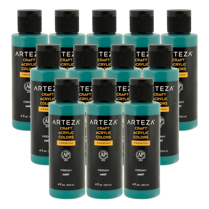 12 bottles of blue green acrylic paint on a white background