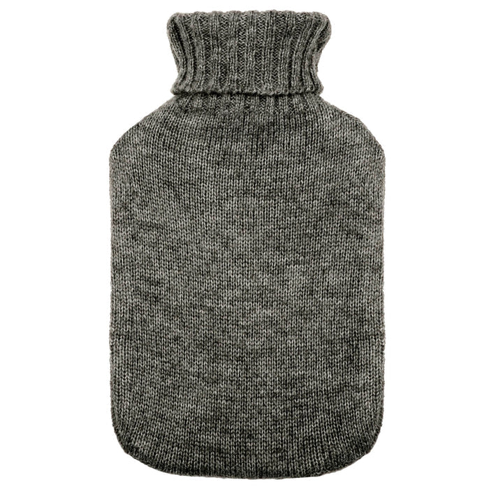 Dark grey knitted cover on a hot water bottle