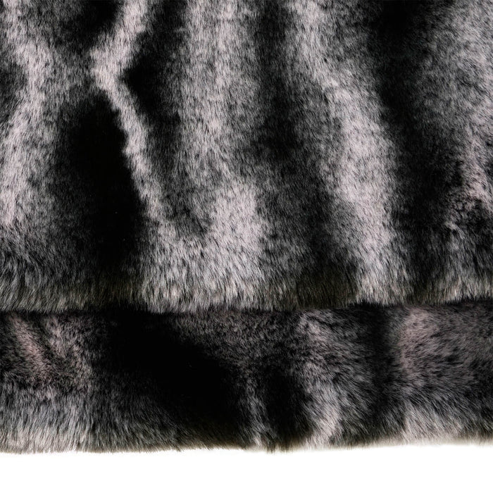 Close up of grey animal print faux fur