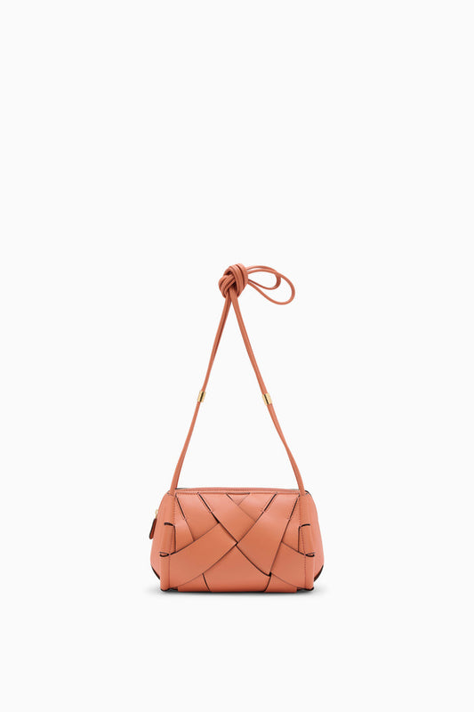 Rose Hand-Woven Leather Charlotte Camera Bag - Front View with Knotted Strap | Ulla Johnson