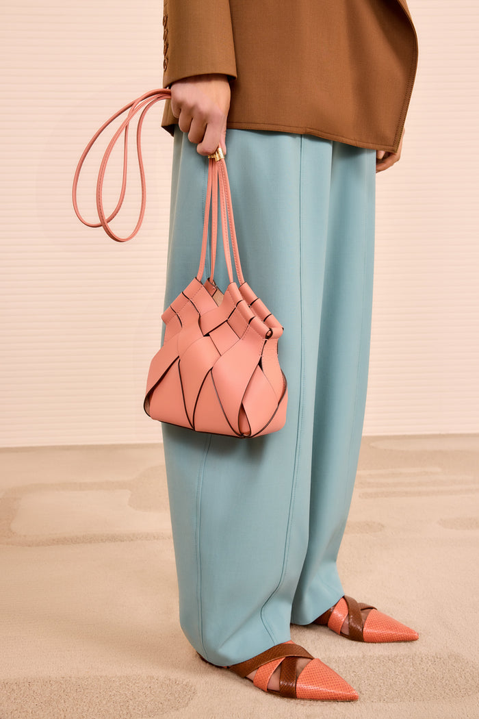 Rose Leather Charlotte Crossbody Bag Held by Model - Styled Look | Ulla Johnson
