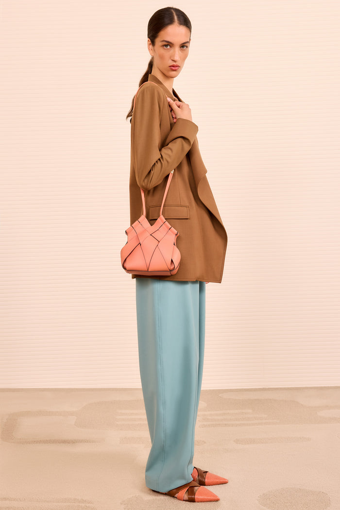 Rose Artisan Leather Charlotte Crossbody on Model - Full-Length Side View | Ulla Johnson