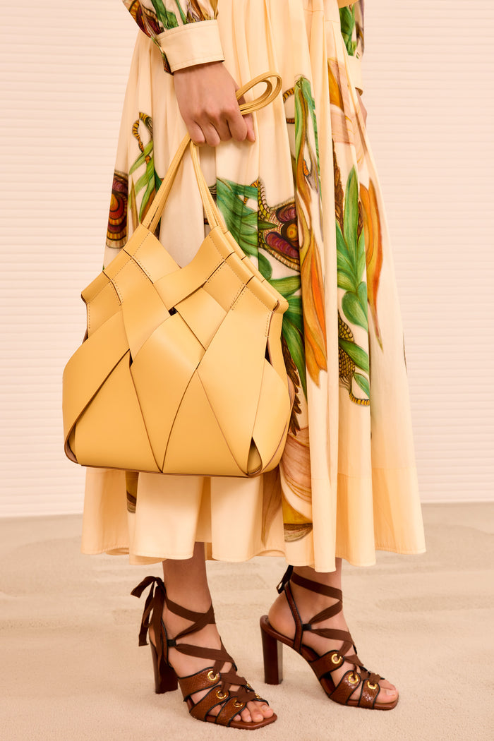 Lotus Yellow Charlotte Bag Styled with Floral Dress | Ulla Johnson