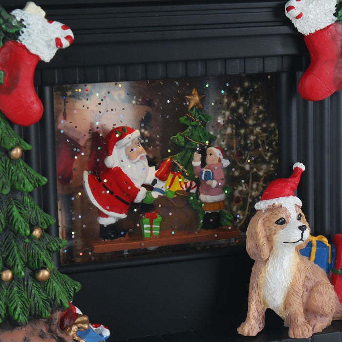 close up of glitter moving inside fireplace scene on ornament