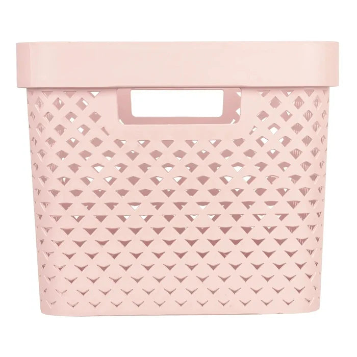Side view of handle and pattern on a medium size pink Curver Pure storage basket