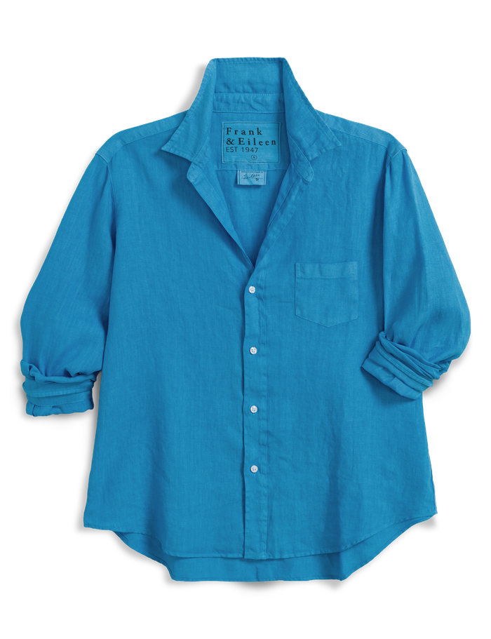 Blue button-up shirt with rolled-up sleeves on a transparent background