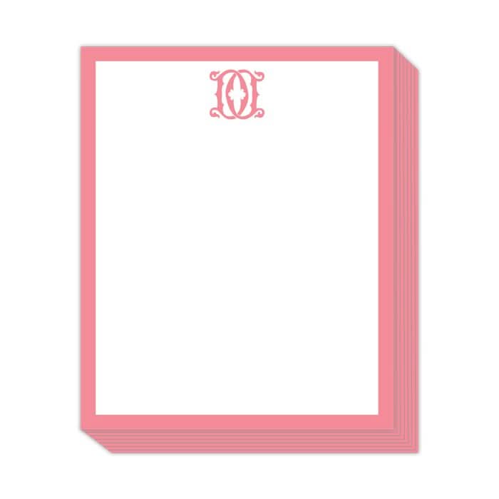 The Gift Bar - Short Stack Pad includes decorative stationery with text weight sheets featuring a pink border and an ornate pink monogram O at the top center, set against a crisp white background, and elegantly sized at 5.25 x 6.5".