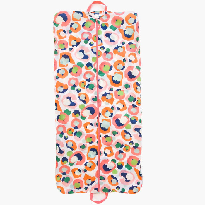 From the Emily McCarthy Collection, the Gulf Stream Garment Bag - Multi Spot Cheetah showcases a vibrant multicolored abstract design with circles and irregular shapes in shades of orange, pink, blue, and green. It includes a central zipper and a top handle for convenient carrying.