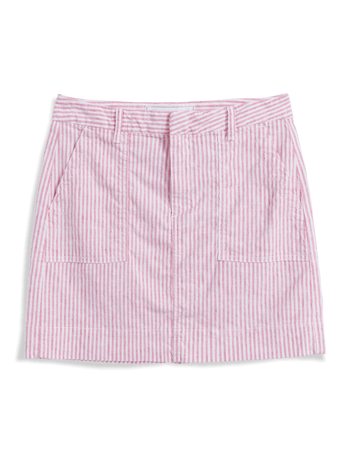Red and white striped skirt on a black background