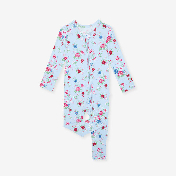 Floral baby onesie on a light blue background