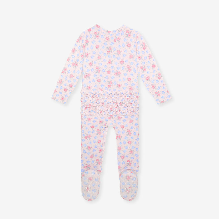Back image of floral patterned baby onesie on a white background