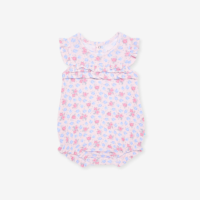 Baby romper with floral pattern on a white background