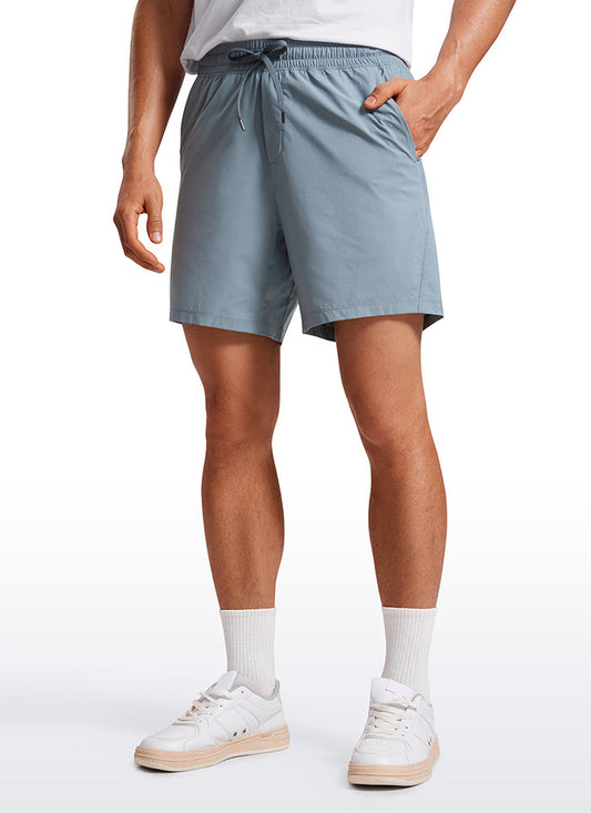 CRZ YOGA Men's Training Quick Dry Pocketed Linerless Shorts 7'' Belgian Blue