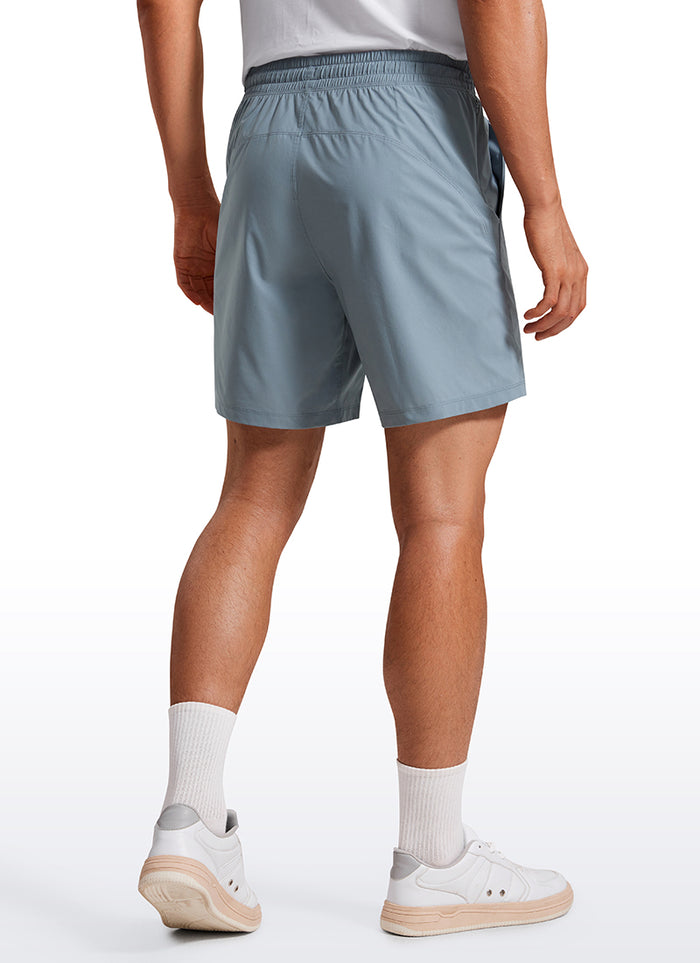 CRZ YOGA Men's Training Quick Dry Pocketed Linerless Shorts 7'' Belgian Blue