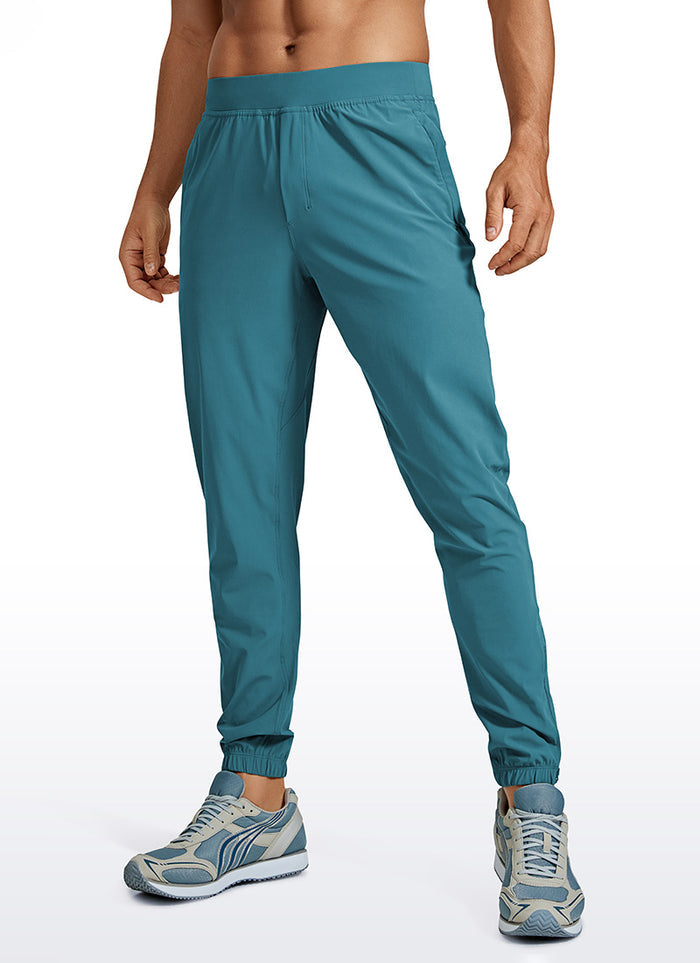 CRZ YOGA Men's Running Slim Fit Lightweight Joggers 29"-Zipper Pockets Washed Blue