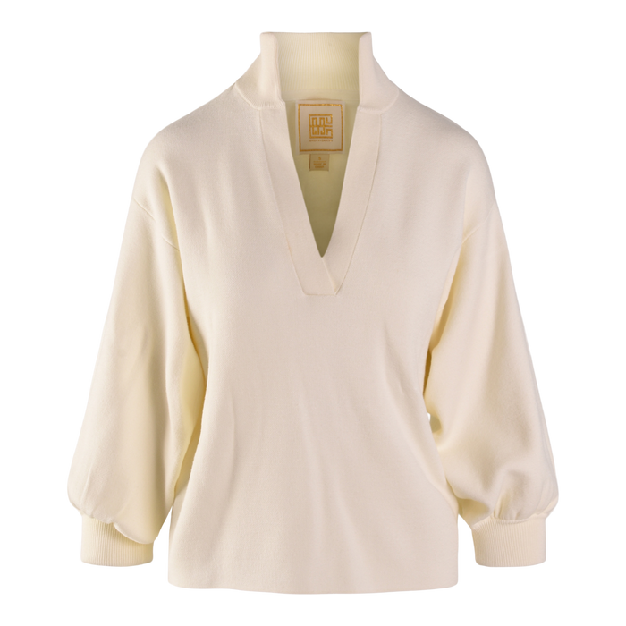 The cream Lolli Sweater features long blouson sleeves, a wide V-neckline, ribbed cuffs, a structured collar, and an inside back neck label for added detail. Its slightly loose fit offers both comfort and style.