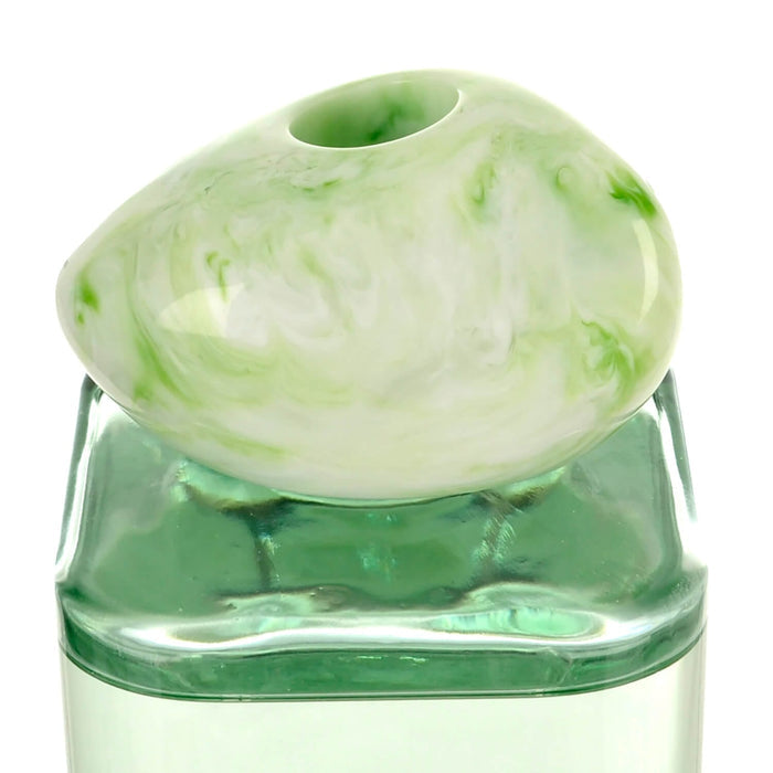 Close up of a green marbled stone effect bottler topper