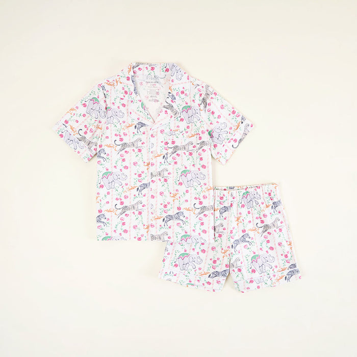 Children's pajama set with animal print on a light background