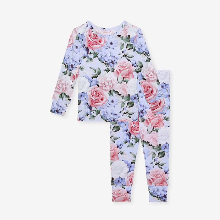 Floral pajama set with pink roses and green leaves on a white background
