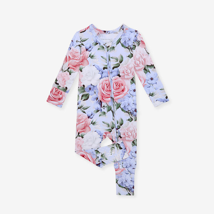 Floral patterned baby onesie on a white background