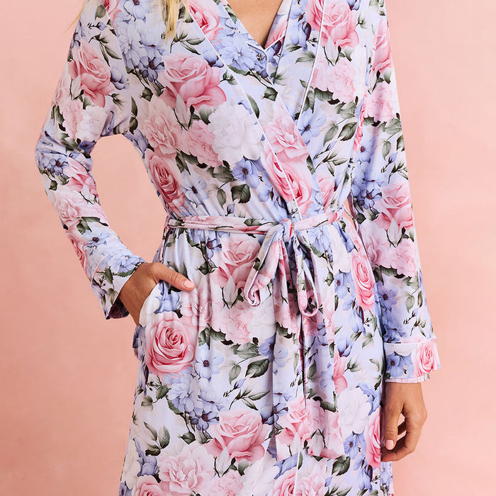 Floral patterned robe on a pink background