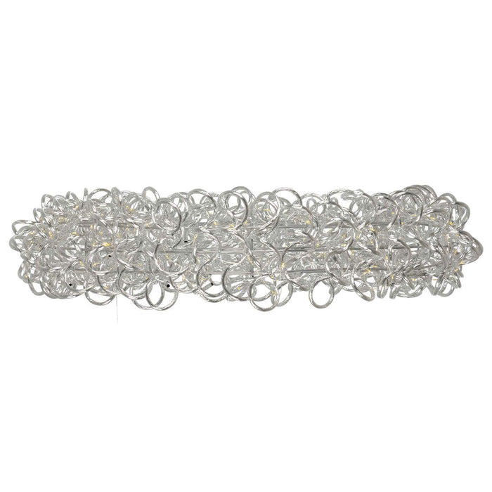 Side view of a pre-lit silver Christmas wreath with warm white LED lights