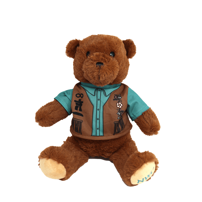 Northy Bear plush toy wearing indigenous shirt
