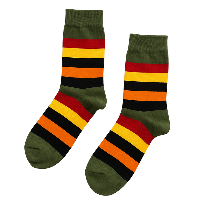 Olive Pine argyle socks top-down view on neutral surface, olive green with warm stripe detail