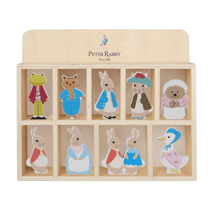 peter rabbit and friends wooden character figure inside display shelf on white background