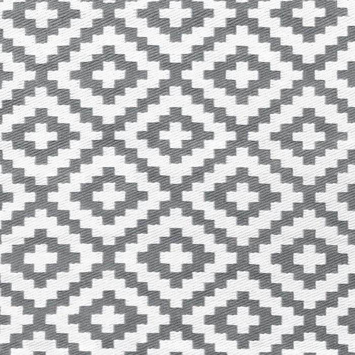 Grey and white diamond pattern woven plastic outdoor rug