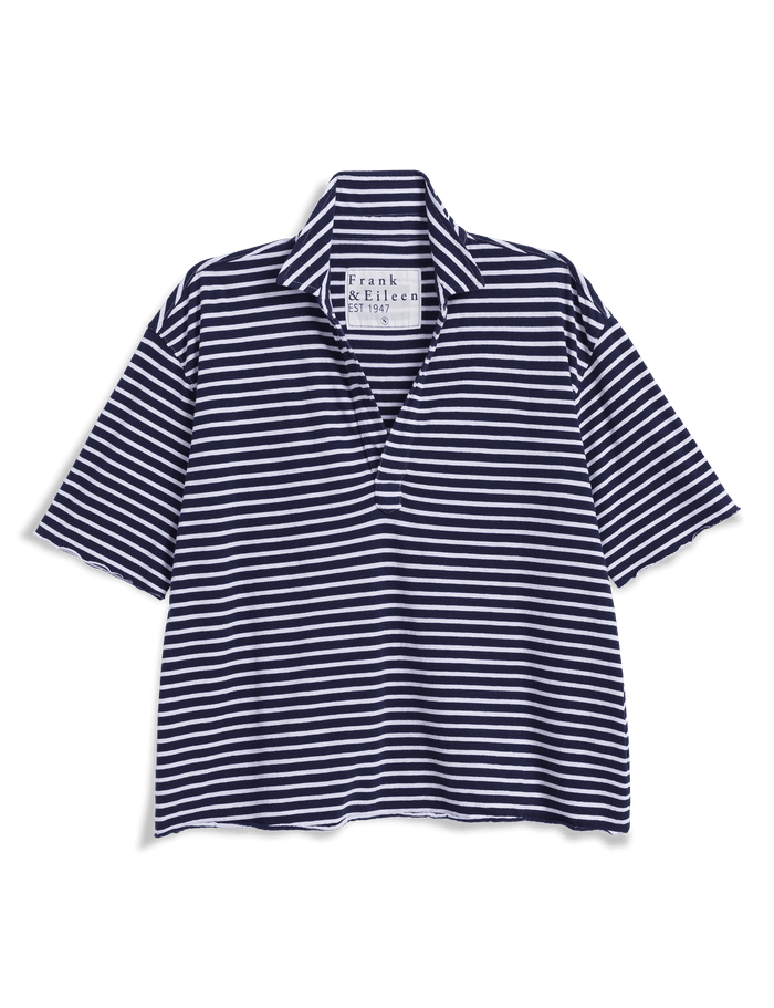 Navy and white striped polo shirt on a black background