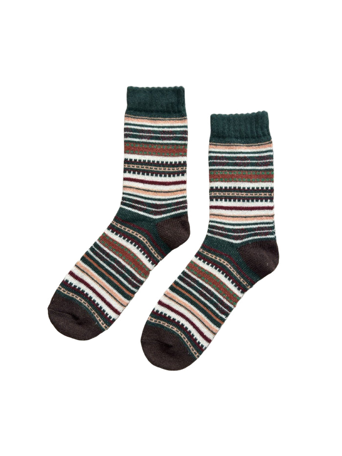 Pine Loom socks close-up showing textured wool-blend knit in forest green and brown