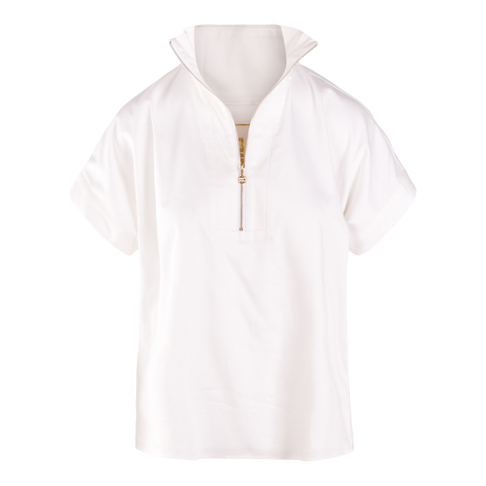 The Poppy Pullover is a short-sleeved white cotton poplin top with a stand-up collar and front half-zipper, shown on a plain white background—a stylish wardrobe essential.